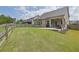 Beautifully maintained backyard featuring a lush lawn and outdoor dining space at 3940 Frasier Dr, Cumming, GA 30028
