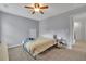 Bright and airy bedroom with neutral colors and cozy carpeted floors at 3940 Frasier Dr, Cumming, GA 30028