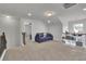 Spacious bonus room with plush carpeting and versatile living area at 3940 Frasier Dr, Cumming, GA 30028