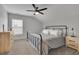 Serene main bedroom with soft lighting, neutral colors, and stylish furnishings at 3940 Frasier Dr, Cumming, GA 30028