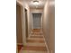 Hallway with tan and white tiled floor leading into a naturally-lit home at 519 Roy Sw St, Atlanta, GA 30310