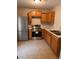 Efficient kitchen layout with stainless steel appliances and neutral countertops at 519 Roy Sw St, Atlanta, GA 30310