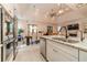 Spacious kitchen features stainless steel appliances, granite countertops, and an open layout at 5960 Overlook Club Cir, Suwanee, GA 30024