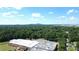 Enjoy scenic views of this property, surrounded by mature trees and a nearby building at 2039 Gober Ave Se, Smyrna, GA 30080