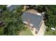 Aerial view of a single-Gathering home showing the roof, front porch and surrounding yard at 2039 Gober Ave Se, Smyrna, GA 30080