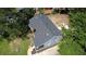 Aerial view of a home showing new roof, siding, landscaping and private drive at 2039 Gober Ave Se, Smyrna, GA 30080