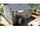 View of home's exterior showing siding, windows, walk-out basement and detached garage at 2039 Gober Ave Se, Smyrna, GA 30080