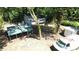 View of the home's backyard, including a covered parking area, storage shed and detached garage at 2039 Gober Ave Se, Smyrna, GA 30080