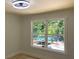 This bedroom features a large window with natural views and recessed lighting at 2039 Gober Ave Se, Smyrna, GA 30080