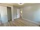 Spacious bedroom with a sliding door closet and new floors throughout the house at 2039 Gober Ave Se, Smyrna, GA 30080