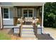 Cozy front porch with comfortable seating, ideal for relaxing outdoors at 2039 Gober Ave Se, Smyrna, GA 30080