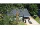 Aerial view of a charming single-Gathering home with new roof and covered front porch at 2039 Gober Ave Se, Smyrna, GA 30080