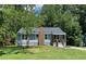 Charming single-story home with a well-manicured lawn and inviting curb appeal at 2039 Gober Ave Se, Smyrna, GA 30080
