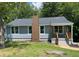 Lovely house with a covered front porch, perfect for enjoying the outdoors at 2039 Gober Ave Se, Smyrna, GA 30080