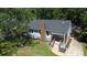 Charming single-Gathering home with new roof, inviting porch and well-manicured front yard at 2039 Gober Ave Se, Smyrna, GA 30080