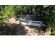 A detached two-car garage surrounded by trees and vegetation at 2039 Gober Ave Se, Smyrna, GA 30080