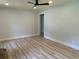 Spacious living room with hardwood floors, recessed lighting, and a neutral color scheme at 2039 Gober Ave Se, Smyrna, GA 30080