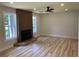 The living room boasts a modern fireplace, recessed lighting, and an open floor plan at 2039 Gober Ave Se, Smyrna, GA 30080