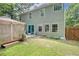 Well-maintained backyard with a gazebo and direct access to the house through elegant double doors at 3347 Sable Run Rd, Atlanta, GA 30349