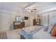This bedroom features a bed, dressers, decor and a ceiling fan at 3347 Sable Run Rd, Atlanta, GA 30349