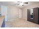 Neutral bedroom features plush carpet, natural lighting and mirrored wardrobe for storage at 3347 Sable Run Rd, Atlanta, GA 30349