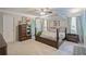 This bedroom features a canopy bed, furniture, and natural light creating a serene and inviting atmosphere at 3347 Sable Run Rd, Atlanta, GA 30349