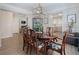 Charming dining room featuring hardwood floors, stylish decor and access to other rooms at 3347 Sable Run Rd, Atlanta, GA 30349