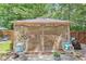 Inviting gazebo with comfortable seating, charming decor, and a serene outdoor atmosphere at 3347 Sable Run Rd, Atlanta, GA 30349