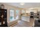 Kitchen with convenient breakfast bar and walk-out to fenced yard and patio at 3347 Sable Run Rd, Atlanta, GA 30349