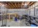 Unfinished basement with block walls, exposed ceiling, and concrete floor providing potential for customization at 3470 Hill Ln, Acworth, GA 30102