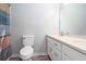Bathroom featuring double sinks and a toilet and a shower curtain at 3470 Hill Ln, Acworth, GA 30102