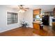 Cozy kitchen with hardwood floors and a breakfast bar at 3470 Hill Ln, Acworth, GA 30102