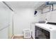 Laundry room featuring a washing machine and shower at 3470 Hill Ln, Acworth, GA 30102