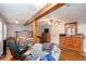 This is a spacious main bedroom with exposed beams and natural light at 3470 Hill Ln, Acworth, GA 30102