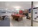 Finished basement with pool table and sports decor, great for entertaining at 388 Rose Creek Pl, Woodstock, GA 30189