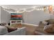 Relaxing basement with comfortable seating, perfect for movie nights at 388 Rose Creek Pl, Woodstock, GA 30189