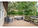 Well-equipped outdoor deck, featuring barbeque, lounge, patio heater and a sun sail at 388 Rose Creek Pl, Woodstock, GA 30189