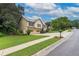 Well-maintained home featuring a spacious driveway and beautifully landscaped front yard at 388 Rose Creek Pl, Woodstock, GA 30189
