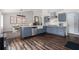 Modern kitchen featuring stainless steel appliances and a breakfast nook at 388 Rose Creek Pl, Woodstock, GA 30189
