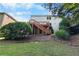 Spacious backyard with a wooden deck, stairs, and well-maintained lawn, perfect for outdoor entertaining at 109 Hale View Cir, Canton, GA 30114
