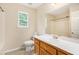 Bathroom with neutral paint, a white vanity, and a combined tub and shower at 3255 Marine Rd, Cumming, GA 30041