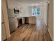 Bright and airy kitchen featuring stainless steel appliances and modern white cabinetry at 525 Parkway Ne Dr # 306, Atlanta, GA 30308