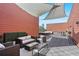 Inviting rooftop deck with comfortable seating, offering a relaxing outdoor space with shade at 525 Parkway Ne Dr # 306, Atlanta, GA 30308