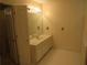 View of a vanity and mirror inside the bathroom at 5820 Elm Tree Dr, Buford, GA 30518