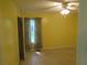 Inviting bedroom with neutral walls and ceiling fan at 5820 Elm Tree Dr, Buford, GA 30518
