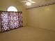 Vaulted bedroom with carpet floors and a ceiling fan at 5820 Elm Tree Dr, Buford, GA 30518