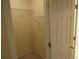 View of small closet with wire shelving and a door at 5820 Elm Tree Dr, Buford, GA 30518