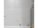 Unfinished basement with visible utility hookups and a water heater at 2310 Whitehead Place Dr, Suwanee, GA 30024