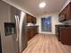 Kitchen featuring stainless steel appliances, wood cabinets, and granite countertops at 1271 Whitlock Ridge Sw Dr, Marietta, GA 30064