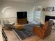Comfortable living room with contemporary furniture, stylish rug, and a fireplace at 1271 Whitlock Ridge Sw Dr, Marietta, GA 30064